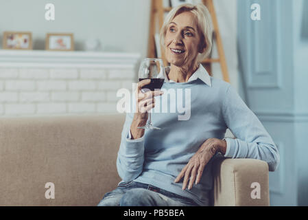 Pleased mature woman having rest Stock Photo