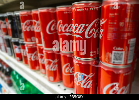 Cans of Coca-Cola in a supermarket in New York on Tuesday, July 24, 2018. The Coca-Cola Co. reports second-quarter earnings on July 25 before the bell. (Â© Richard B. Levine) Stock Photo