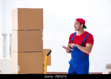 Contractor worker moving boxes during office move Stock Photo