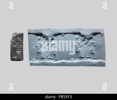 Cylinder seal. Culture: Babylonian. Dimensions: H. 3 cm x Diam. 1.4 cm. Date: ca. 18th-16th century B.C..  Although engraved stones had been used as early as the seventh millennium B.C. to stamp impressions in clay, the invention in the fourth millennium B.C. of carved cylinders that could be rolled over clay allowed the development of more complex seal designs. These cylinder seals, first used in Mesopotamia, served as a mark of ownership or identification. Seals were either impressed on lumps of clay that were used to close jars, doors, and baskets, or they were rolled onto clay tablets that Stock Photo