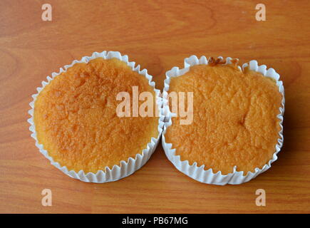 butter cupcake on paper tray Stock Photo