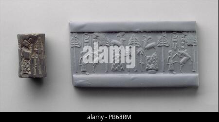 Cylinder seal and modern impression: hunting scene. Culture: Akkadian. Dimensions: H. 1 1/8 in. (2.8 cm). Date: ca. 2250-2150 B.C..  In ancient Mesopotamia, a cylinder-shaped seal could be rolled on a variety of objects made of clay. When seals were impressed on tablets or tablet cases the seal impressions served to identify the authority responsible for what was written in the documents, much as a signature does today. When seals were impressed on sealings -- lumps of clay that were used to secure doors and the lids of storage jars-- the seal impressions served to identify their owner and pro Stock Photo