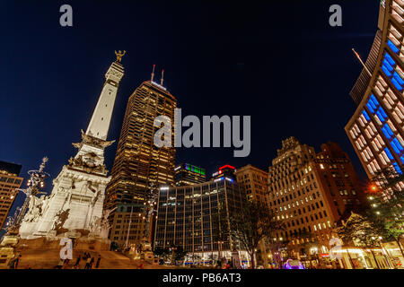 Indianapolis - Circa July 2018: Colorful downtown Indianapolis skyline at the circle with the monument, Salesforce, BMO Harris, Chase, Regions and IPL Stock Photo