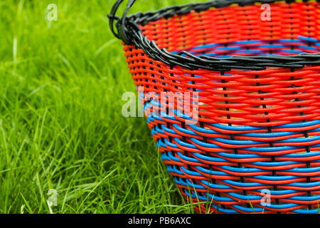 wicker empty basket for products on grass Stock Photo