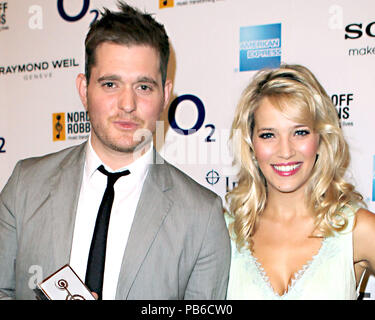 File photo dated 29/06/12 of Michael Buble and his wife Luisana Lopilato, as the couple have welcomed a baby daughter. Stock Photo