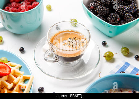 Photo of Viennese waffles,, coffee, raspberries, blackberries Stock Photo