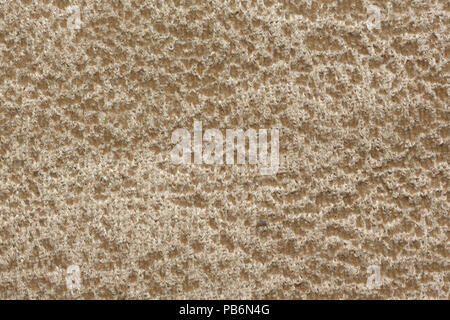 Speckled fabric texture in adorable beige hue. Stock Photo