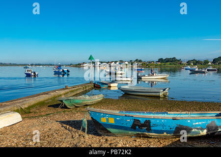 Mudeford Christchurch Dorset England July 23, 2018 Boats moored in the natural harbour at Mudeford Quay Stock Photo