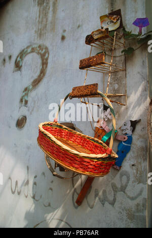 Old Basket hanging outside an antiques shop, Yogyakarta, Indonesia. Stock Photo