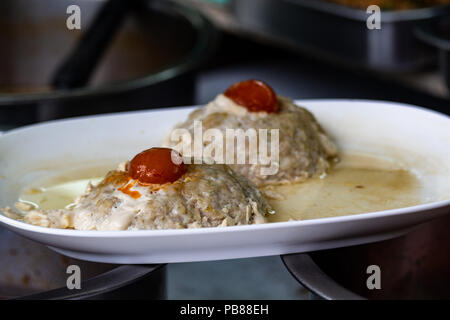 Bangkok, Thailand - May 1, 2018: Plate of local spicy food in a hawkers stall in Bangkok Stock Photo