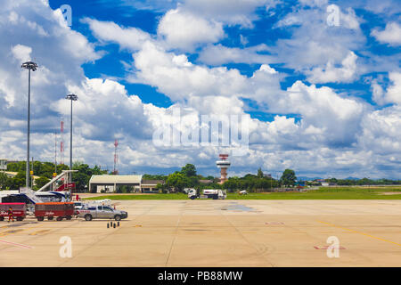 CHIANG MAI, THAILAND - 28 JUNE 2018 - Empty aircraft parking area of Chiang Mai interternational Airport waits for in coming airplane on beautiful day Stock Photo