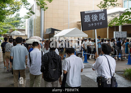 Tokyo, Japan. 27th July, 2018. Visitors line up outside the Ueno Royal Museum to see ''The Miracle of M.C. Escher Prints from The Israel Museum, Jerusalem'' exhibition on July 27, 2018, Tokyo, Japan. The exhibition introduces a selection of 150 works (selected from The Israel Museum) of the Dutch graphic artist Maurits Cornelis Escher at Ueno Royal Museum until July 29. (Photo by Rodrigo Reyes Marin/AFLO) Credit: Aflo Co. Ltd./Alamy Live News Stock Photo