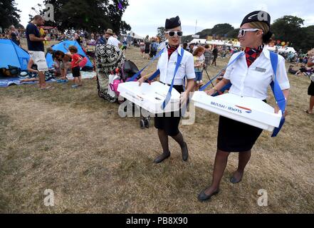 Lulworth Castle, Dorset, UK. 27th July 2018. British Airways flight attendants Credit: Finnbarr Webster/Alamy Live News Stock Photo