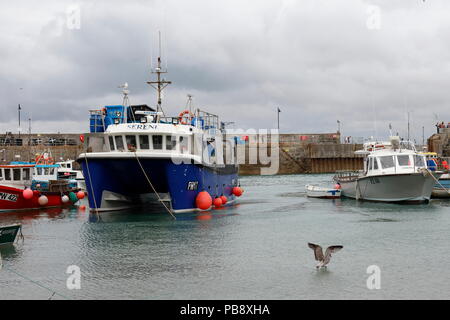 Newquay, Cornwall, UK. 27th July, 2018. A large Catamaran tour boat is docked in Newquay Harbour. Credit: Nicholas Burningham/Alamy Live News Stock Photo