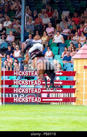 Hickstead, Sussex, UK. 27th July 2018. Winner. Kevin Jochems riding Captain Cooper. NED. Jump Off. The Longines BHS King George V Gold Cup. Longines FEI Jumping Nations Cup of Great Britain at the BHS Royal International Horse Show. All England Jumping Course. Hickstead. Great Britain. 27/07/2018. Credit: Sport In Pictures/Alamy Live News Stock Photo