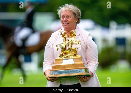 Hickstead, Sussex, UK. 27th July 2018. Lynn Petersen. Chief Executive of the BHS presenting The Longines BHS King George V Gold Cup. Longines FEI Jumping Nations Cup of Great Britain at the BHS Royal International Horse Show. All England Jumping Course. Hickstead. Great Britain. 27/07/2018. Credit: Sport In Pictures/Alamy Live News Stock Photo