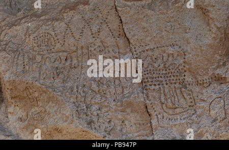 . English: Rock art at the Petroglyph Point Archeological Site, Lava Beds National Monument, California, United States. Inscription: ca. 4500 BCE – ca. 0000 Photography: 24 January 2014 1185 Petroglyph Point 4 - Lava Beds NM California Stock Photo