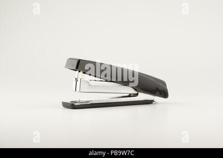 new stapler for stapling papers on a table Stock Photo