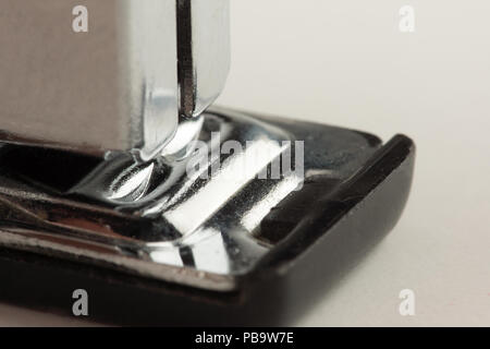 new stapler for stapling papers on a table Stock Photo