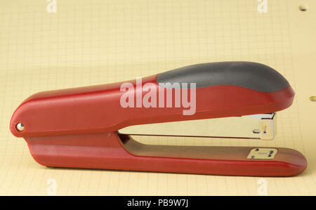 new stapler for stapling papers on a table Stock Photo