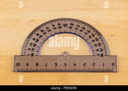 transparent protractor for teaching in school geometry Stock Photo
