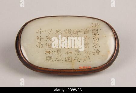 Girdle plaque. Culture: China. Dimensions: H. 5/8 in. (1.6 cm); W. 3 3/4 in. (9.6 cm); D. 2 11/16 in. (6.8 cm). Museum: Metropolitan Museum of Art, New York, USA. Stock Photo