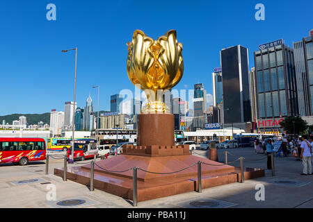 WAN CHAI, HONG KONG, China - june 22 2016: The Golden Bauhinia Square in front of The Expo Promenade is the tourist attraction point in Wan Chai distr Stock Photo