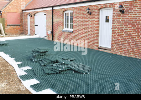 Plastic Grid System Installed Gravel Driveway Protects Ground Prevents  Gravel Stock Photo by ©paulmaguire 205846620