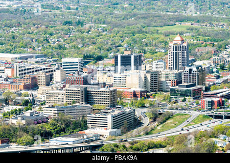 Roanoke, USA - April 18, 2018: Aerial view of cityscape, skyline, downtown view on city, Virginia, business buildings, roads, cars, corporate offices, Stock Photo