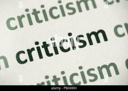 word criticism printed on white paper macro Stock Photo