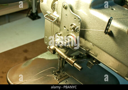 Industrial sewing machine for leather products closeup Stock Photo