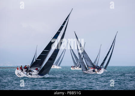 Sail boats racing during the Ilhabela Sailing Week, in Brazil Stock Photo
