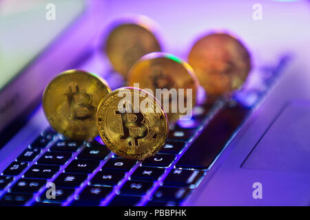 Montreal, Canada, July 26, 2018.Bitcoins on computer keyborad.Credit Mario Beauregard/Alamy Live News Stock Photo