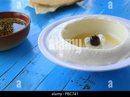 A table set of different plates of a traditional Lebanese breakfast. Stock Photo