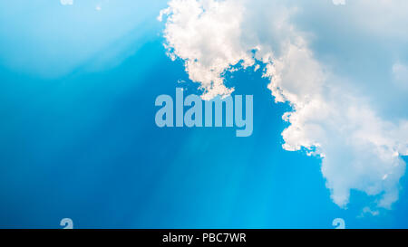 Sky with clouds and sun rays from the bottom Perfect Stock Photo