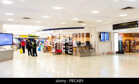 NEW YORK, USA - SEP 21, 2015: Waiting area of the John F. Kennedy International Airport. It is the busiest international air passenger gateway in the  Stock Photo