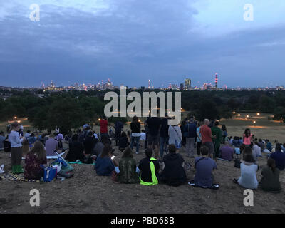 Clouds over London as seen from Primerose Hill, obscuring a view of the 'Blood moon', the longest lunar eclipse of the century which sees Earth's natural satellite turn blood red. Stock Photo