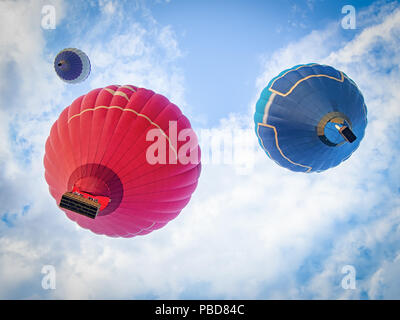 Three balloons bottom view on sky background Stock Photo