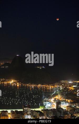 Rio De Janeiro, Brazil. 27th July, 2018. The moon is seen during a lunar eclipse in Rio de Janeiro, Brazil, July 27, 2018. Credit: Li Ming/Xinhua/Alamy Live News Stock Photo