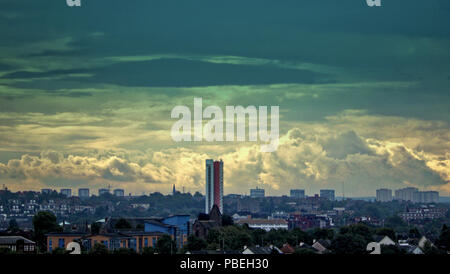 Glasgow, Scotland, UK 28th July. UK Weather: Changeable day with stormy clouds  west of the city over the Anniesland Tower the tallest listed building in Scotland. Gerard Ferry/Alamy news Stock Photo