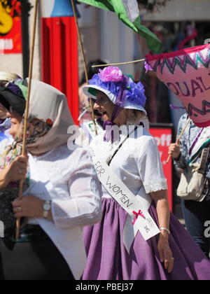 Sheerness, Kent, UK. 28th July, 2018. An Equality Parade celebrating 100 years of women's right to vote was held along Sheerness high street in Kent today at 12pm as part of the Sheppey Promenade Arts Festival. Credit: James Bell/Alamy Live News Stock Photo