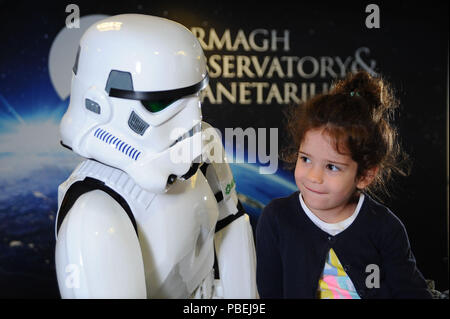 Northern Ireland, UK. 28th July 2018. Eve Harfouche has a word with a Stormtrooper at 'Fifty years of Sci-fi Exhibition' at Armagh Observatory and Planetarium. 28 July 2018.  Credit: Liam McArdle/Alamy Live News Stock Photo