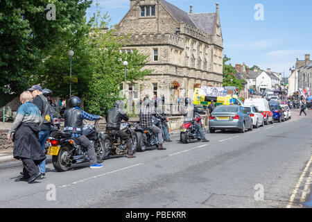 Calne, Wiltshire, UK, 28th July 2018  A group of bikes riding down the main street for the  Calne bike meet  Credit Estelle Bowden/Alamy live news Stock Photo