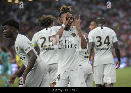 Singapore. 28th July, 2018. Paris Saint-Germain's Christopher Nkunku (front) celebrates after scoring a penalty kick during the International Champions Cup soccer match against Arsenal held in Singapore on July 28, 2018. Credit: Then Chih Wey/Xinhua/Alamy Live News Stock Photo