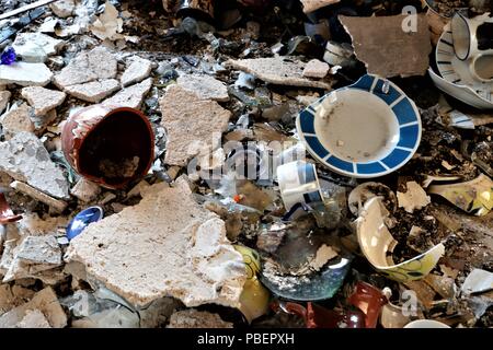 Athens, Greece. 28th July, 2018. Destroyed utensils seen laying on the ground.A visit to a destroyed site by forest fires of the Mati region of Athens. Credit: Helen Paroglou/SOPA Images/ZUMA Wire/Alamy Live News Stock Photo