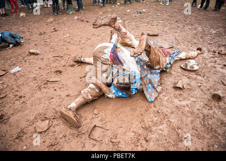 Penrith, UK. 28th July 2018. Festival Goers embrace the rain and mud at Kendal Calling 28/07/2018  Lowther Deer Park, Penrith, Cumbrial © Gary Mather/Alamy Live News Stock Photo