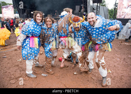 Penrith, UK. 28th July 2018. Festival Goers embrace the rain and mud at Kendal Calling 28/07/2018  Lowther Deer Park, Penrith, Cumbrial © Gary Mather/Alamy Live News Stock Photo