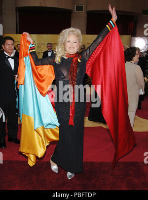 Sally Kirkland arriving at the 79th Academy Awards ( OSCARS ) at the Kodak Theatre in Los Angeles.  full length smile eye contact multicolored dressKirklandSally068 Red Carpet Event, Vertical, USA, Film Industry, Celebrities,  Photography, Bestof, Arts Culture and Entertainment, Topix Celebrities fashion /  Vertical, Best of, Event in Hollywood Life - California,  Red Carpet and backstage, USA, Film Industry, Celebrities,  movie celebrities, TV celebrities, Music celebrities, Photography, Bestof, Arts Culture and Entertainment,  Topix, vertical, one person,, from the year , 2007, inquiry tsuni Stock Photo