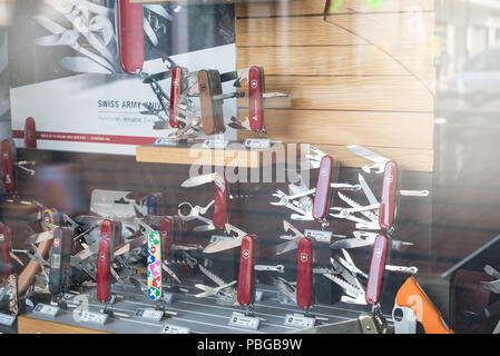 Swiss knife shop; knifes multifunctional with many tools Stock Photo