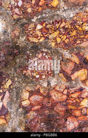 Cemented naural flint rough stone wall background Stock Photo